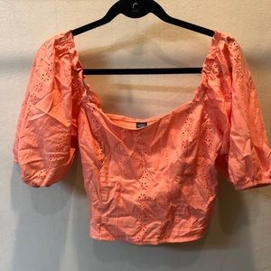 Orange floral lace top with puff shoulders